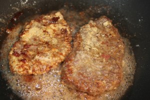brown cubed steaks in oil