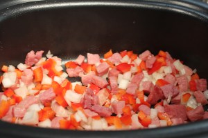 Add onions and red bell peppers