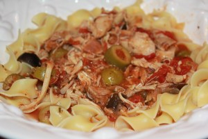 Chicken thighs with Tuttorosso tomatoes and olives