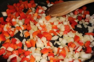 Saute  red peppers and onions