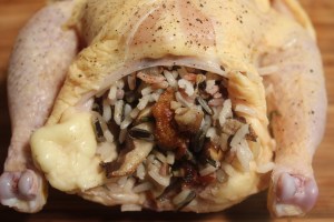 Stuff the hen with rice and mushrooms