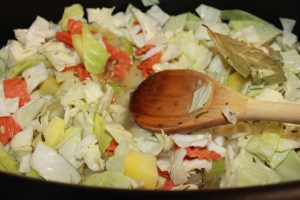 Cabbage, broth, etc. go into the soup