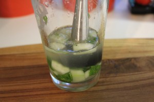Muddle the mint, cucumber, etc.