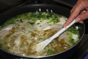 Stir in sour cream and chilies