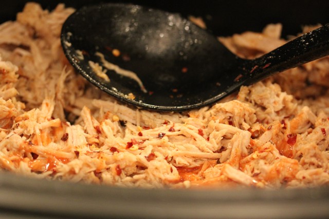 Add bbq sauce to shredded pork