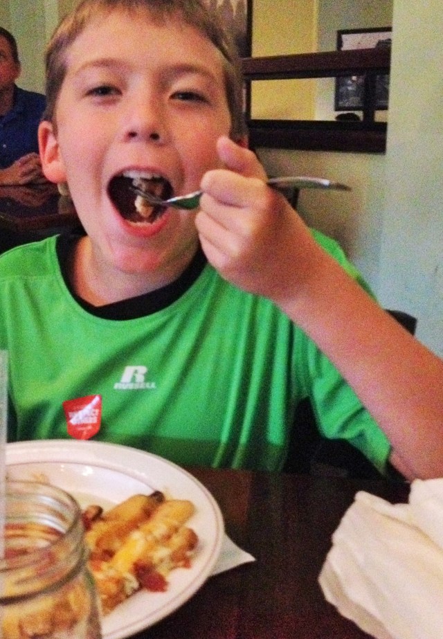 Gabe enjoying his chicken