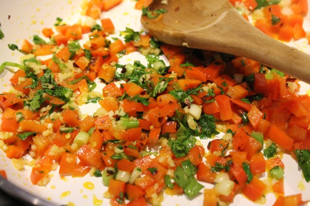 Saute red peppers, spring onions, cilantro, garlic, etc.