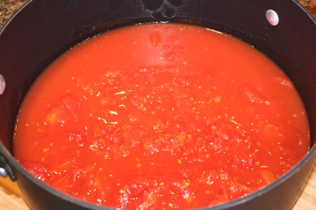 Squish tomatoes for minestrone