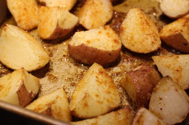 Flip potatoes halfway through roasting