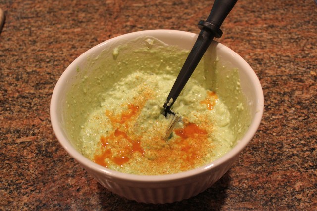 Add hot sauce and salt to avocado mixture