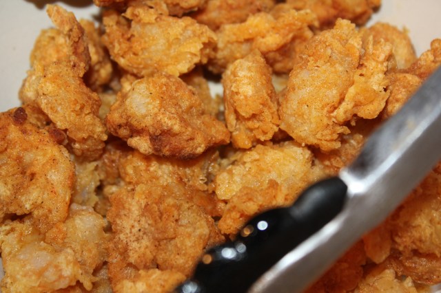 Place fried shrimp in a bowl