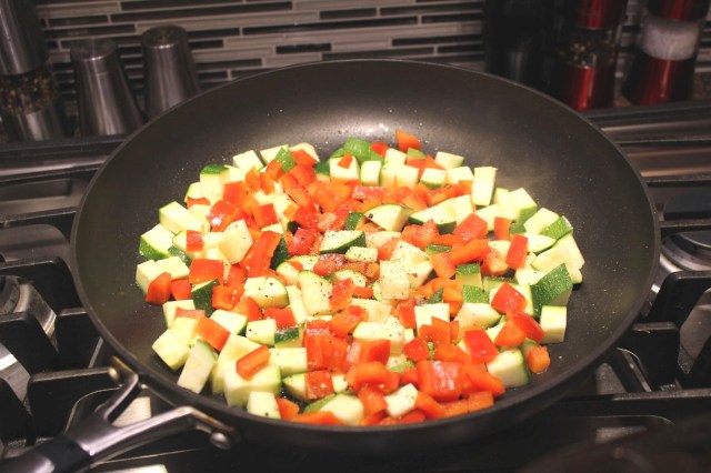 Saute zucchini, red peppers, etc.