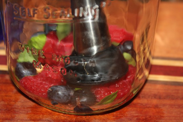 Gently smash the berries