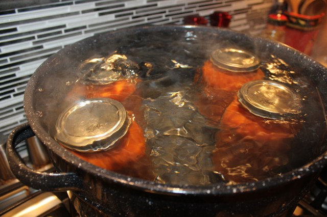 Process marinara sauce in hot water bath