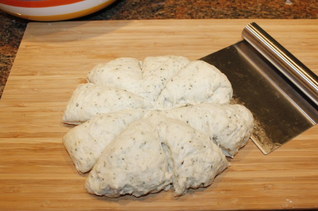 Divide the calzone dough into 8 pieces