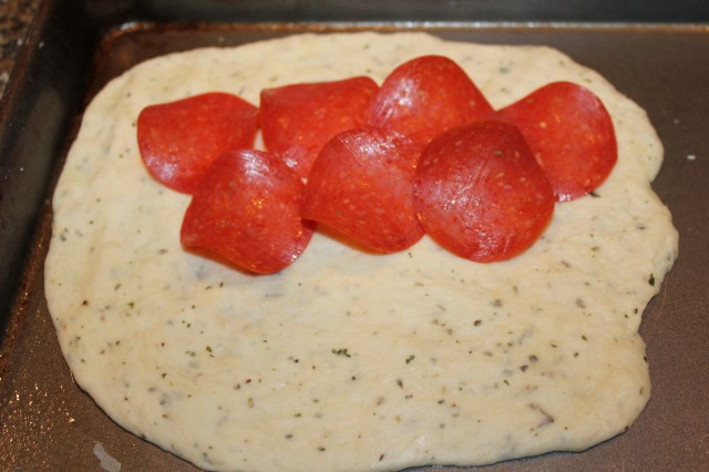 Place pepperoni on flatbread