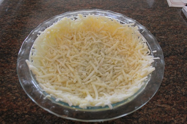 Press hash browns in pie plate