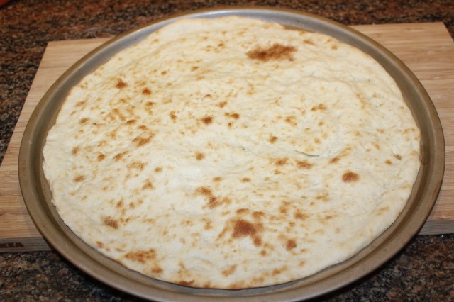 Remove dough from oven