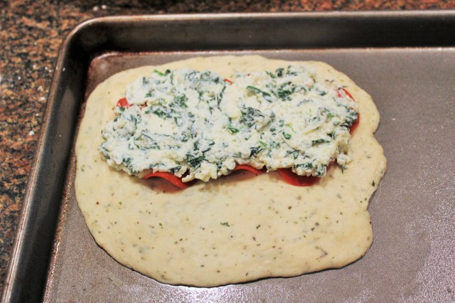 Spread spinach and cheese mixture on top of pepperoni