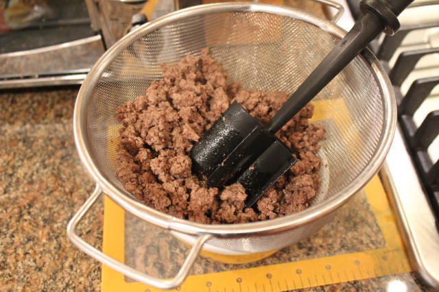 Drain and crumble ground beef