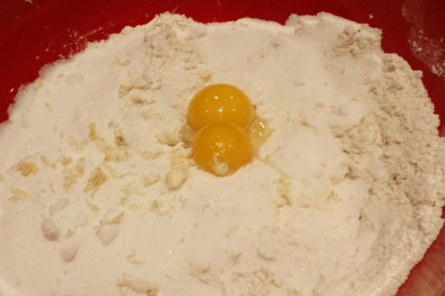 Add eggs, etc. to flour