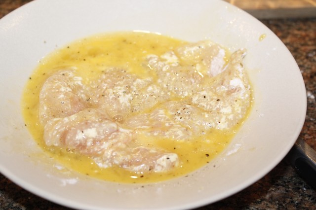 Place chicken in egg mixture