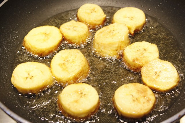Place plantain slices in skillet