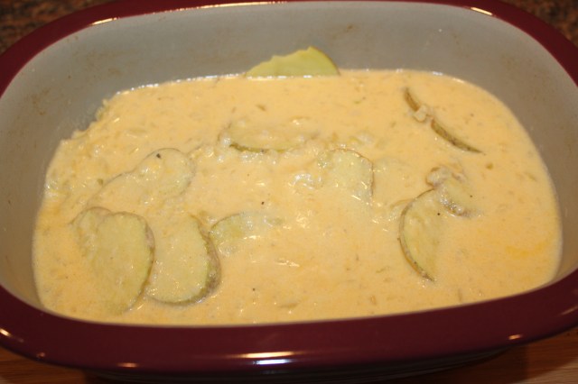 Add sauce to potatoes