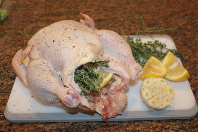 Stuff chicken with lemon garlic thyme