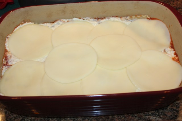 Add the provolone slices