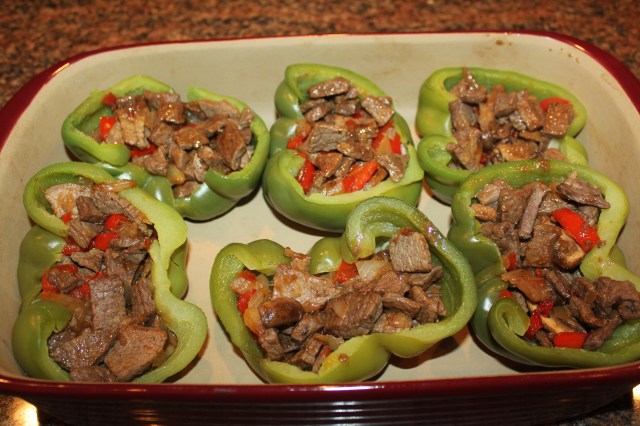 Stuff peppers with cheesesteak mixture