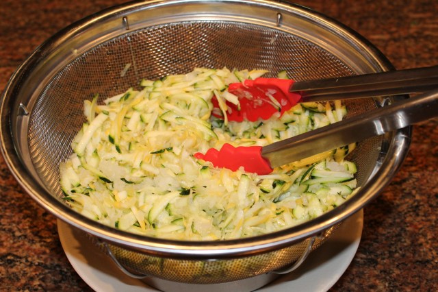 Mix grated zucchini, squash and onion