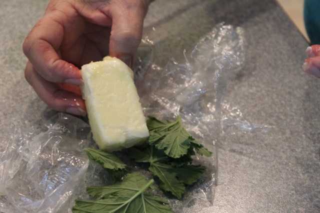 Remove rose geranium leaves from butter