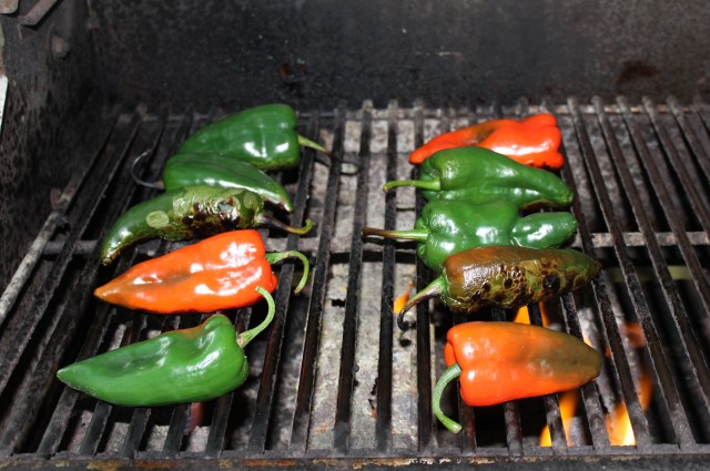 Char peppers on grill