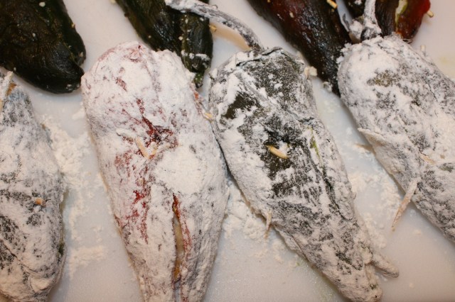 Dredge peppers in flour