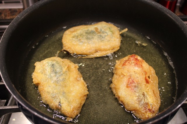 Saute chile rellenos until golden brow.