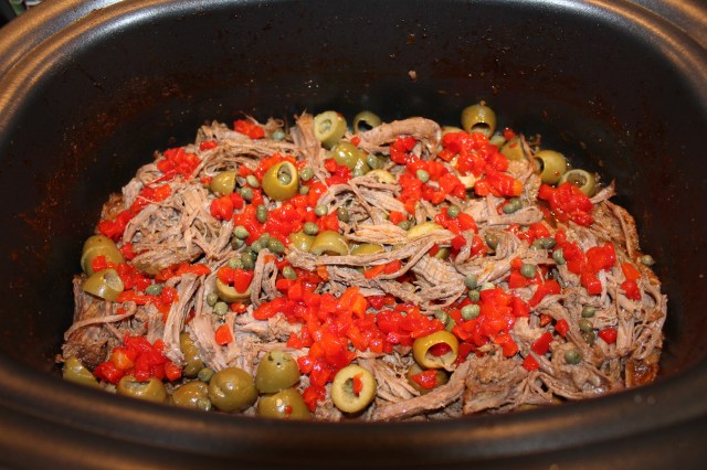 Add olives, pimentos, capers, etc. to shredded beef