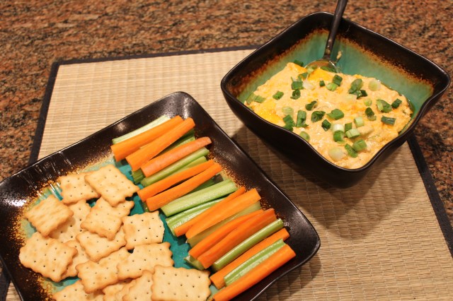 Serve Kel's buffalo dip with veggies and crackers