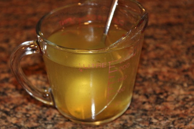 Dissolve bouillon cube in boiling water