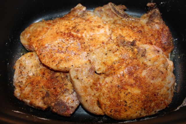 Place browned pork chops in slow cooker