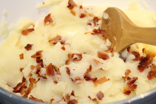 Add bacon to potatoes