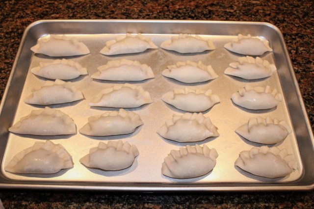 place-pot-stickers-on-baking-sheet-to-freeze-for-later