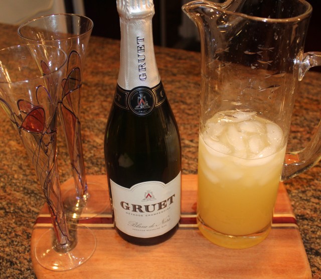 strain-rum-mixture-into-pitcher