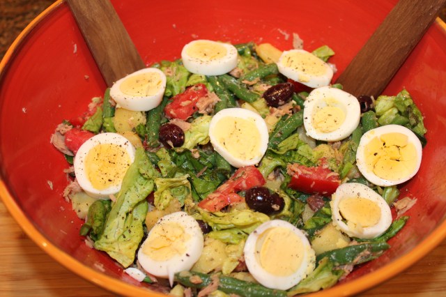 Garnish Kel's nicoise salad with hard boiled egg slices