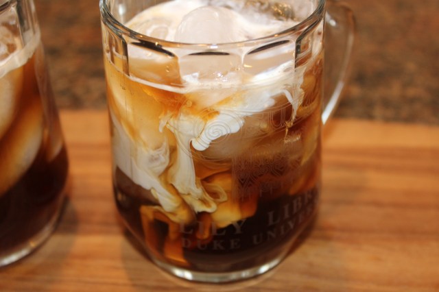 Slowly add cream to coffee mixture