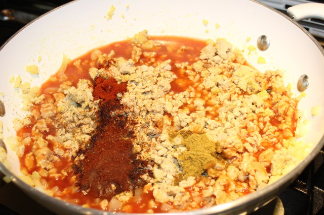 Add spices, etc. to browned turkey