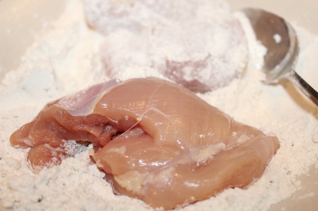 Dredge thighs in flour