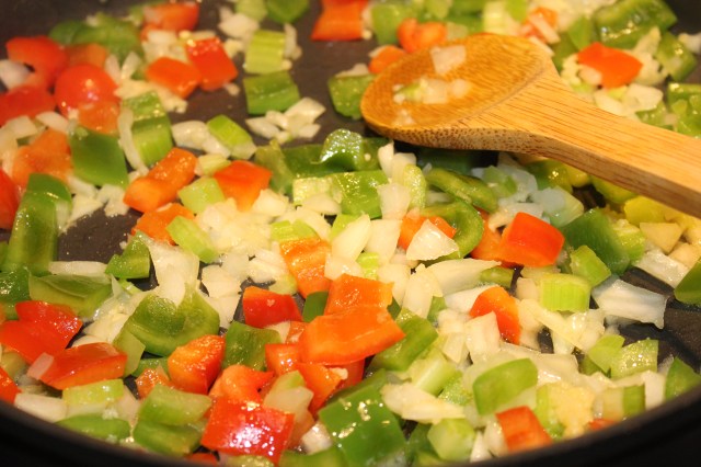 Saute peppers, onions, etc.