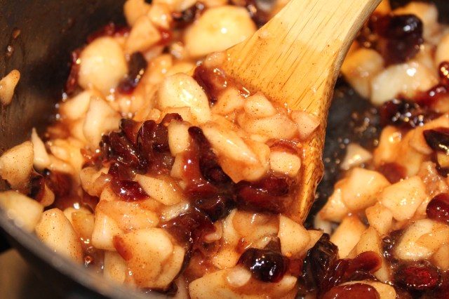 Heat apple caranberry pie filling until it thickens
