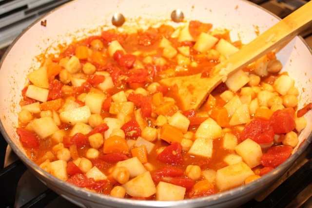 Add chickpeas, tomatoes and potatoes